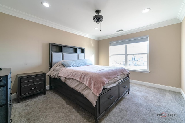 bedroom with baseboards, visible vents, recessed lighting, ornamental molding, and light carpet