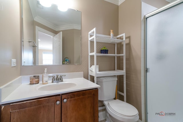 full bathroom with vanity, toilet, a stall shower, and crown molding