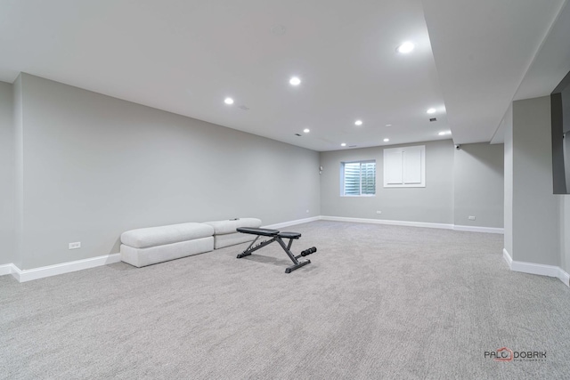 workout room with recessed lighting, baseboards, and carpet