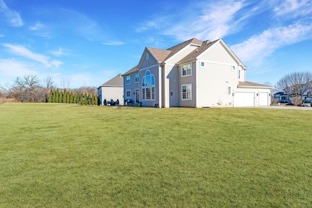 view of side of home featuring a yard