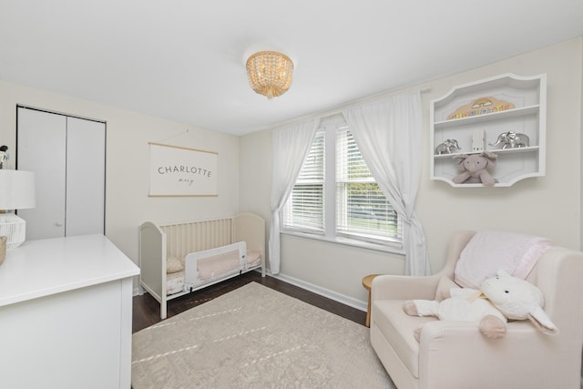 bedroom with hardwood / wood-style floors