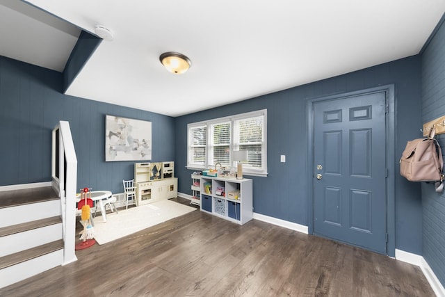 game room featuring dark hardwood / wood-style flooring