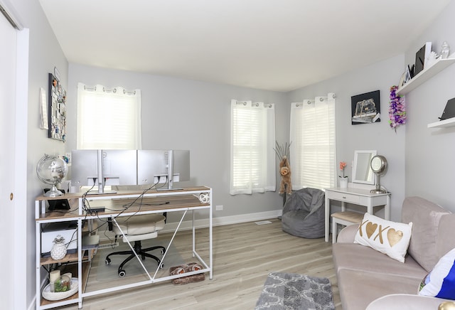 home office featuring light wood-type flooring