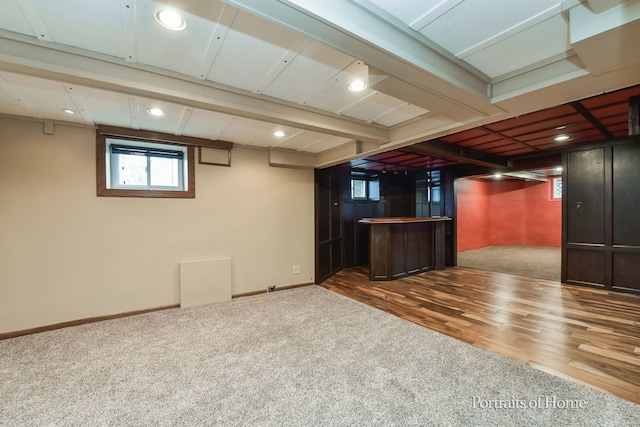 basement featuring hardwood / wood-style flooring