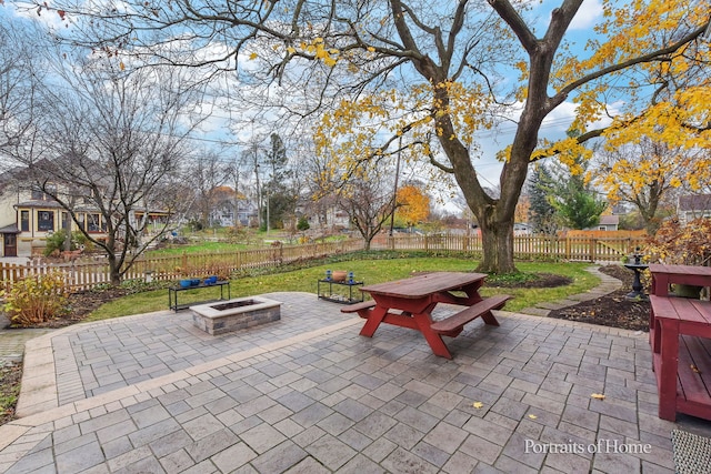 view of patio / terrace with an outdoor fire pit