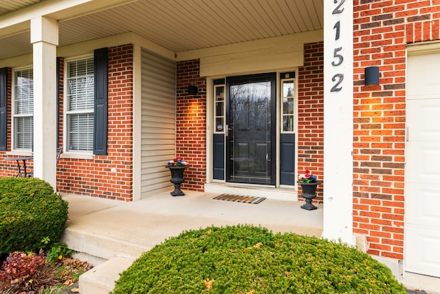 entrance to property with a porch