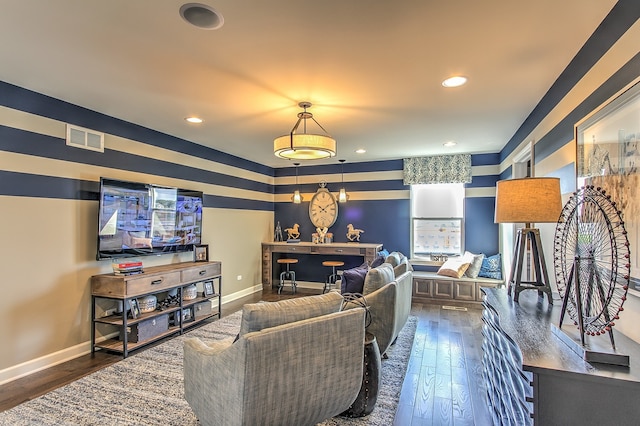 living room with dark hardwood / wood-style floors