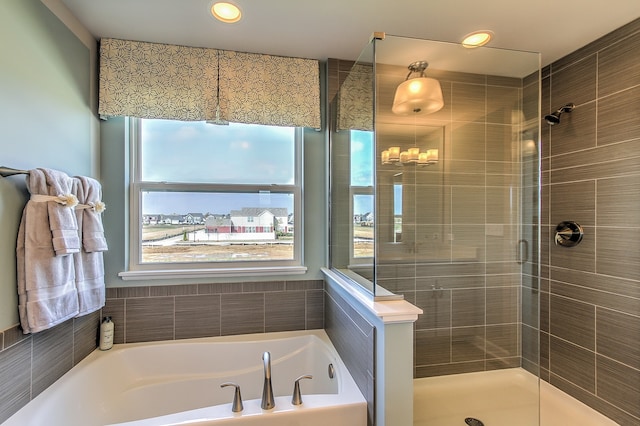 bathroom with independent shower and bath