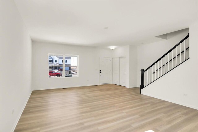 dining area featuring a notable chandelier, dark hardwood / wood-style flooring, built in features, and a wealth of natural light