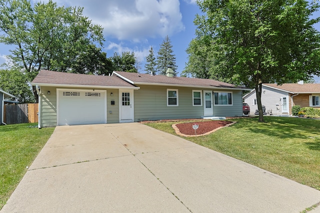 single story home featuring a front lawn and a garage