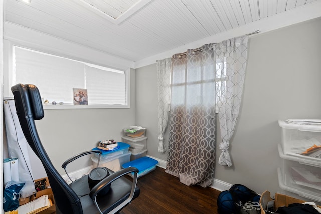 miscellaneous room with ornamental molding, dark wood-type flooring, and wood ceiling