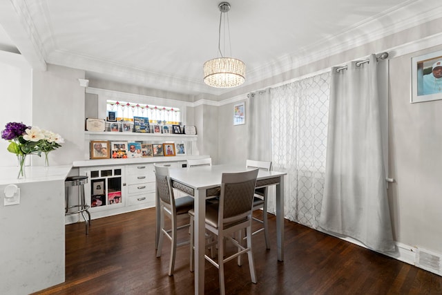 dining space featuring ornamental molding, dark hardwood / wood-style floors, and an inviting chandelier