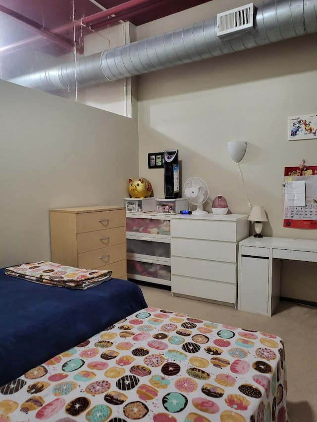 bedroom featuring light colored carpet