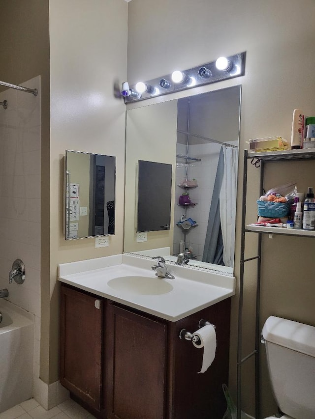 full bathroom featuring tile patterned floors, vanity, shower / bathtub combination with curtain, and toilet