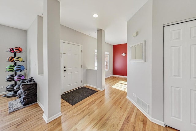 foyer entrance featuring hardwood / wood-style floors