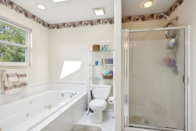 bathroom with tile patterned floors, independent shower and bath, and toilet