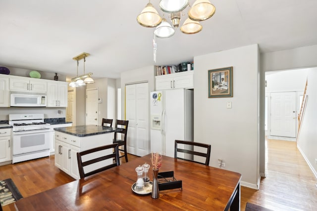 dining room featuring wood-type flooring