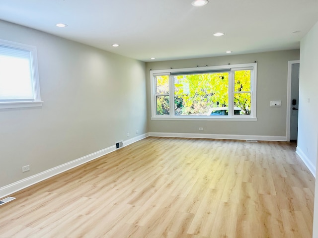 empty room featuring light hardwood / wood-style floors