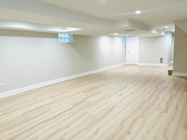 basement with light wood-type flooring