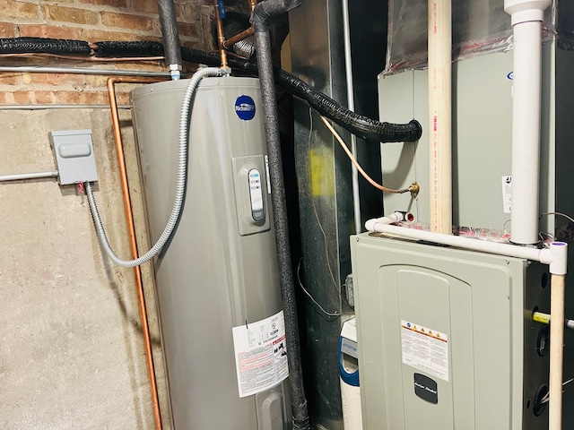 utilities featuring electric water heater and heating unit