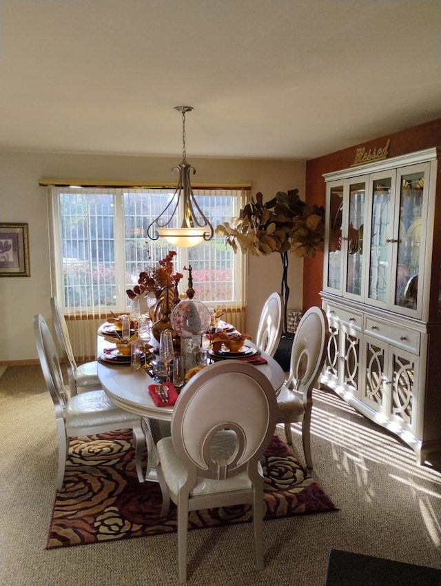 dining area with carpet