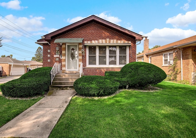 view of front of home with a front lawn