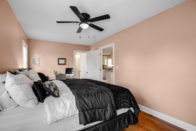 bedroom featuring ceiling fan and wood-type flooring