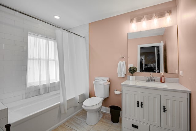 full bathroom with tile patterned floors, vanity, shower / bath combo, and toilet