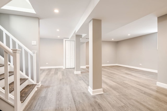 basement with light wood-type flooring