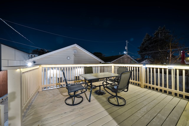 view of deck at twilight