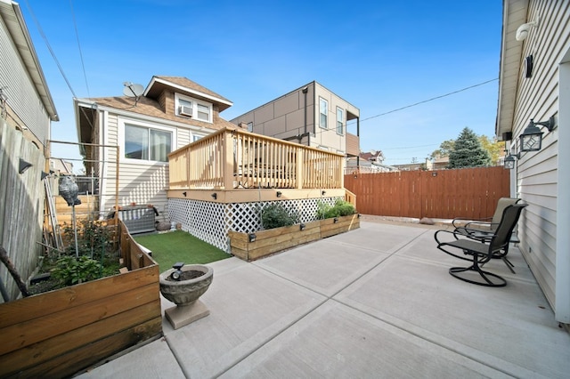 view of patio with a wooden deck