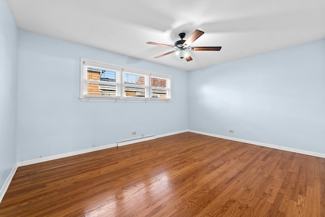 unfurnished room featuring baseboard heating, ceiling fan, and wood-type flooring