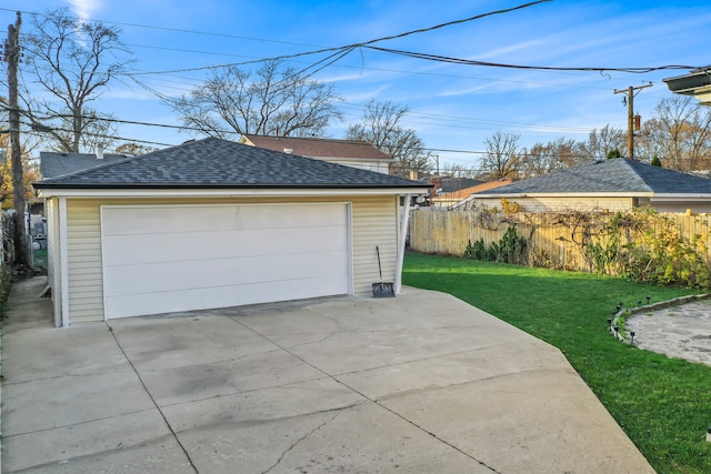 garage with a lawn