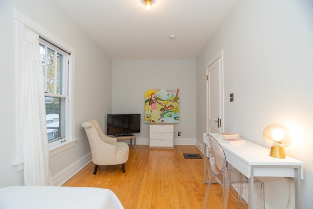 bedroom featuring wood-type flooring