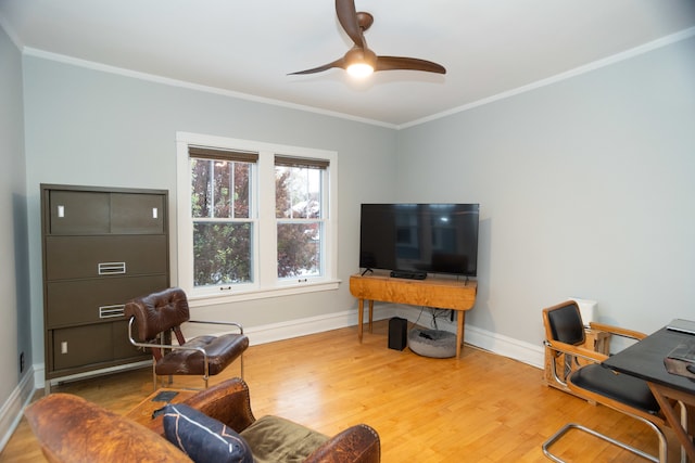 office space featuring hardwood / wood-style flooring, ceiling fan, and ornamental molding