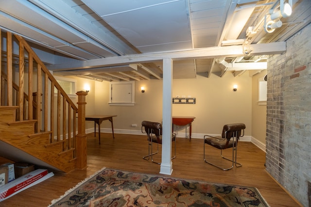 basement featuring wood-type flooring