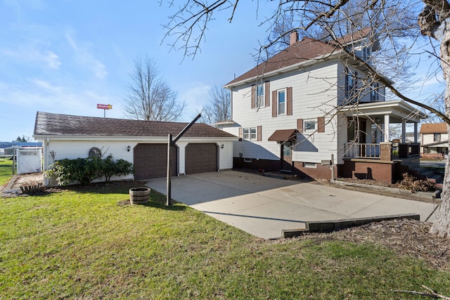 exterior space with a yard and a garage