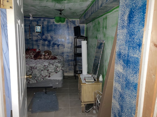 bathroom with tile patterned floors