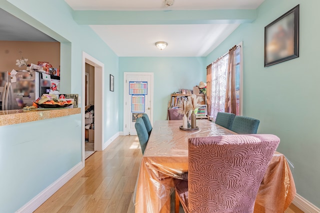 dining room with light wood-type flooring