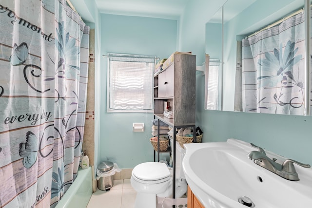 full bathroom with tile patterned flooring, vanity, toilet, and shower / tub combo with curtain