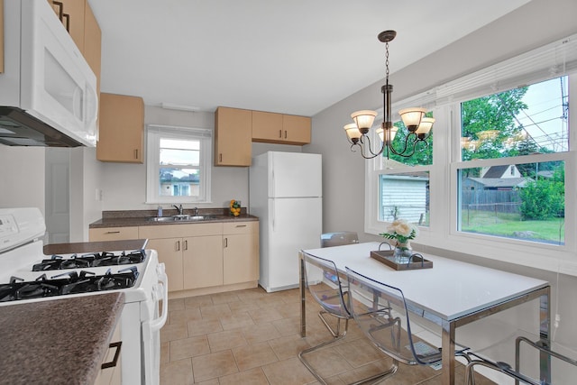 kitchen featuring white appliances, an inviting chandelier, sink, light brown cabinetry, and decorative light fixtures