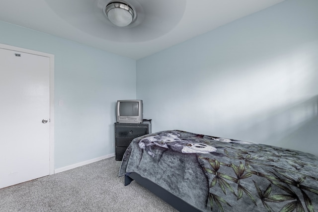 bedroom featuring ceiling fan and carpet floors