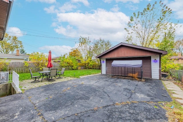 garage with a yard