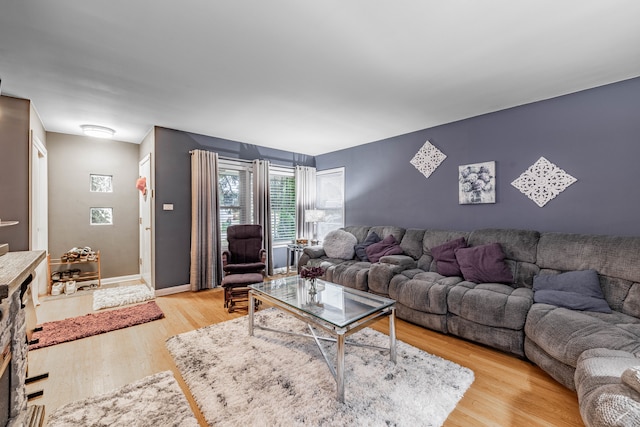 living room with light hardwood / wood-style floors