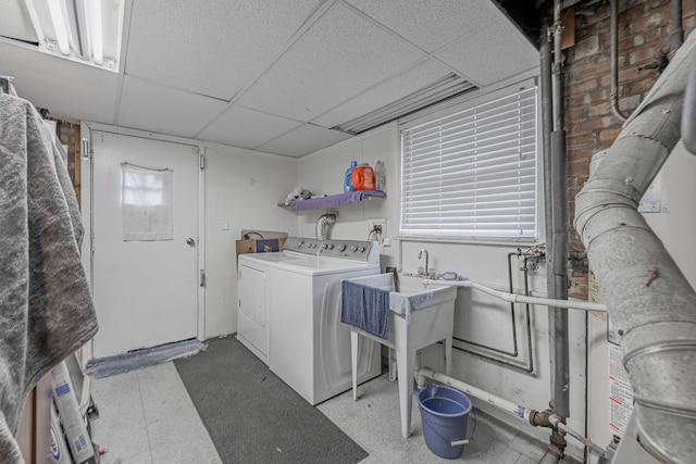 laundry room featuring separate washer and dryer