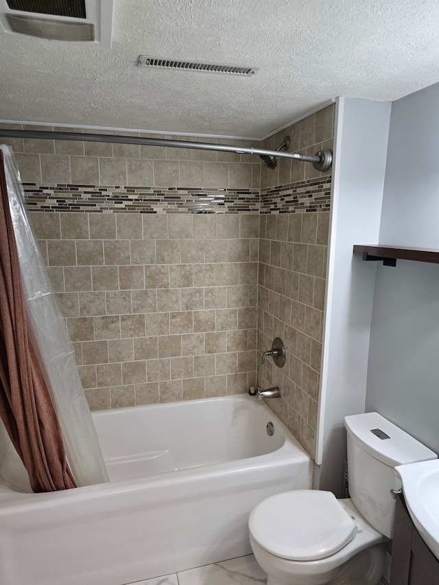 full bathroom with vanity, a textured ceiling, toilet, and shower / tub combo with curtain