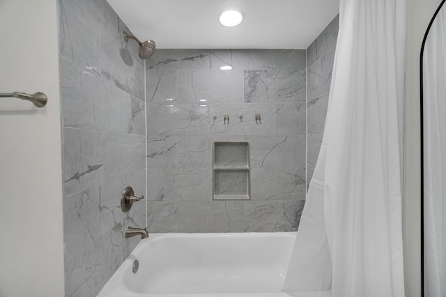 bathroom featuring shower / bath combo with shower curtain