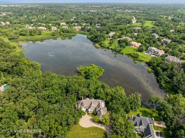 bird's eye view with a water view