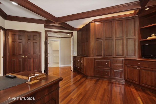 unfurnished office with dark wood-type flooring and beam ceiling