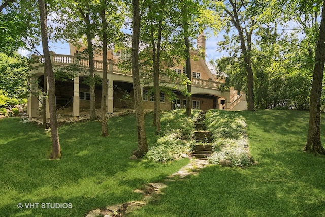 view of yard with a deck